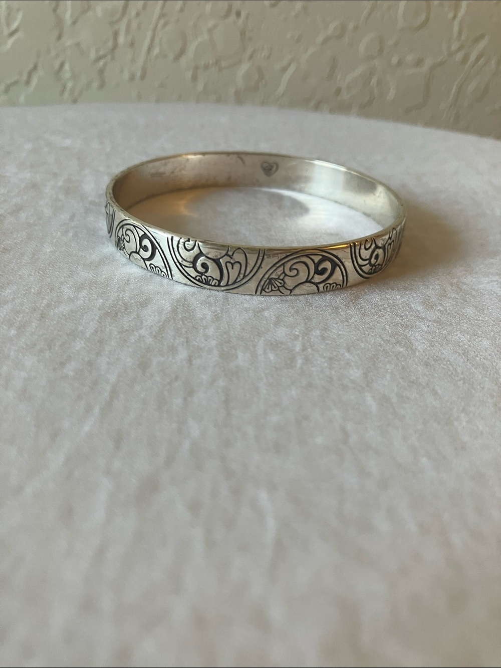 Brighton: Silver Tone Floral Engraved Bangle Bracelet- flaws